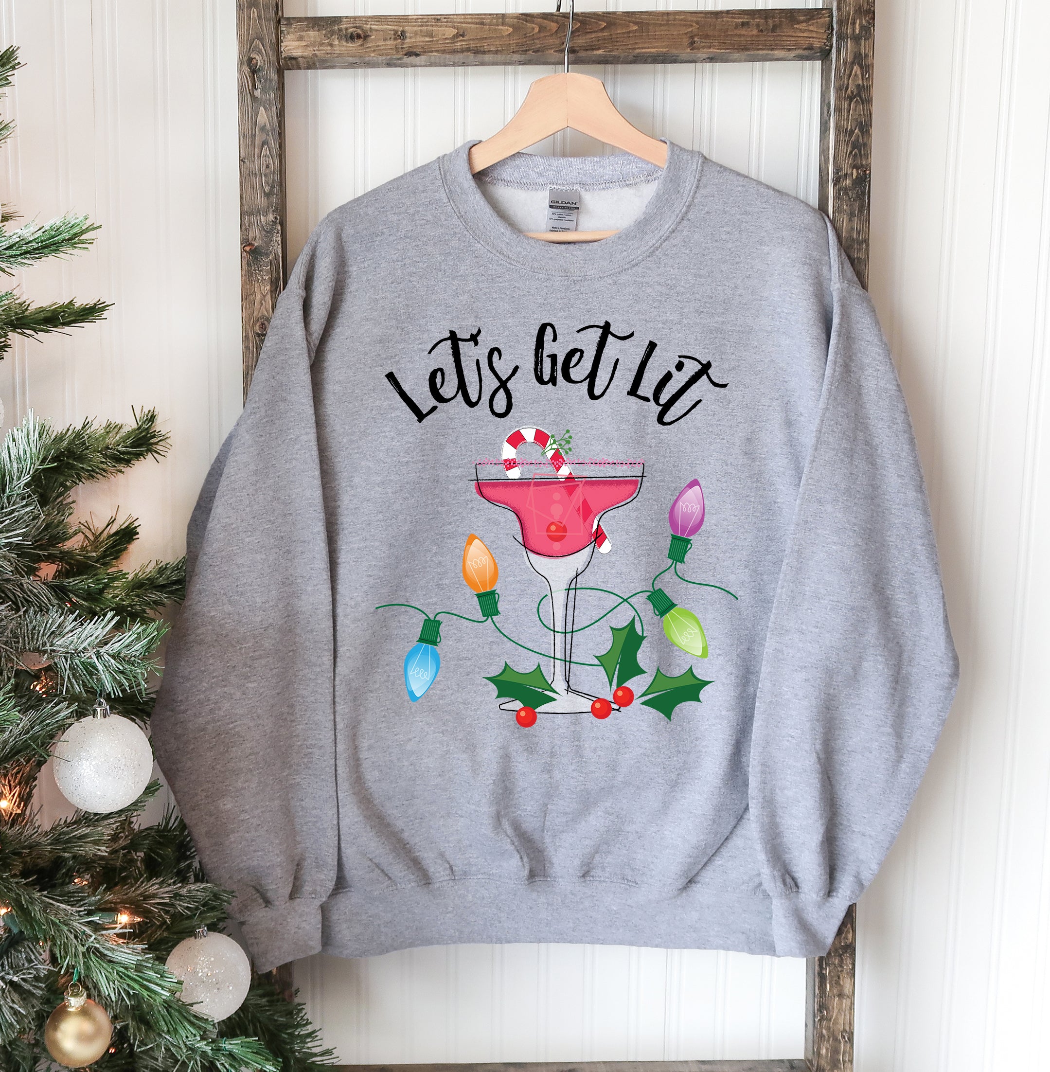 Let's Get outlets Lit Sweater